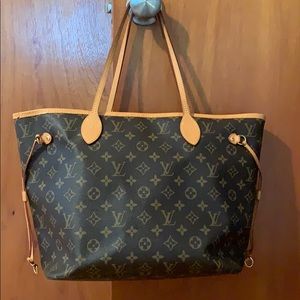 Louis Vuitton never full with magenta interior